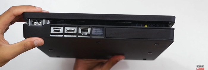 On the back, there is a Gigabit Ethernet port, HDMI 1.4 pot, Auxiliary port for PlayStati...
