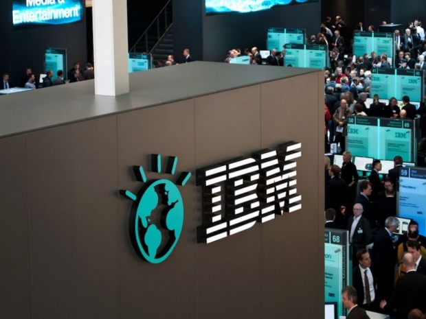 IBM shares rise as suits make a return