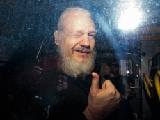 Assange faces broader charges